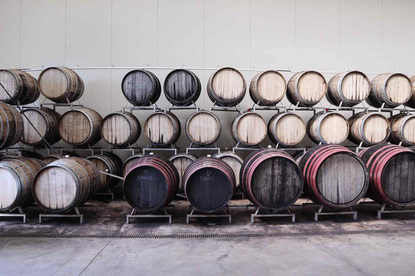 What is re-racking and why is it used for whisky casks?